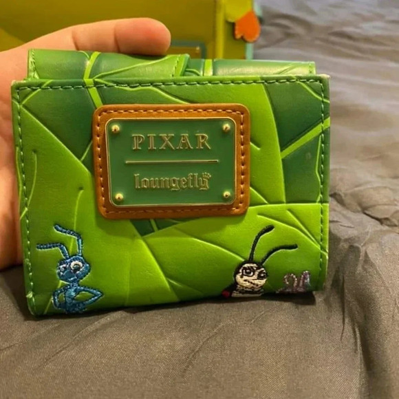 Heimlich Loungefly Backpack and leaf wallet